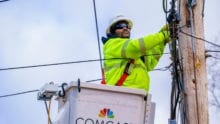 comcast worker working on wires